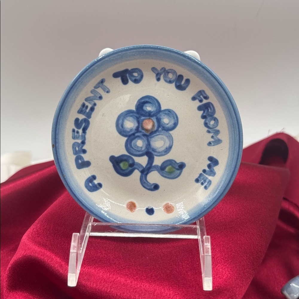 A 4. 1/4” inch trinket dish or coaster from M.A. Hadley Pottery.